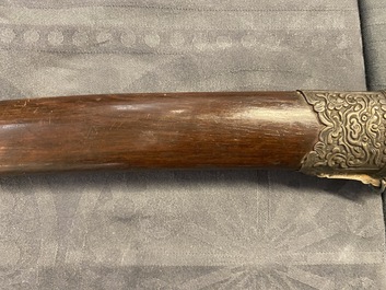 A Chinese or Vietnamese silver, tie li mu wood and bone sword, 19th C.